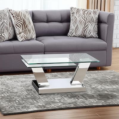 HomeRoots 32" Clear And Silver Glass And Stainless Steel Floor Shelf Coffee Table - 31.5 in. x 17 in. x 23.5 in.