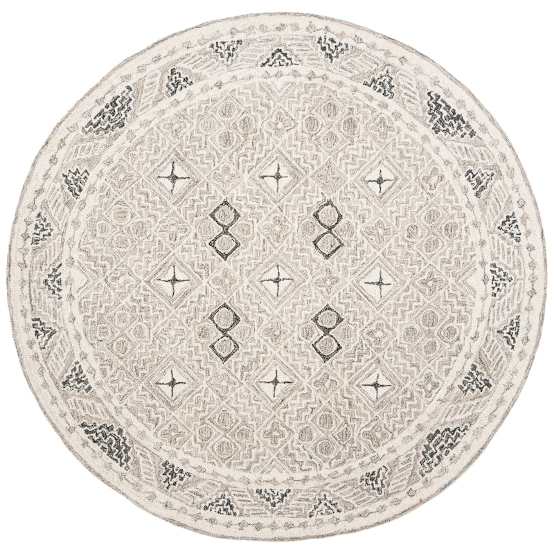SAFAVIEH Handmade Micro-Loop Jelske Wool Rug
