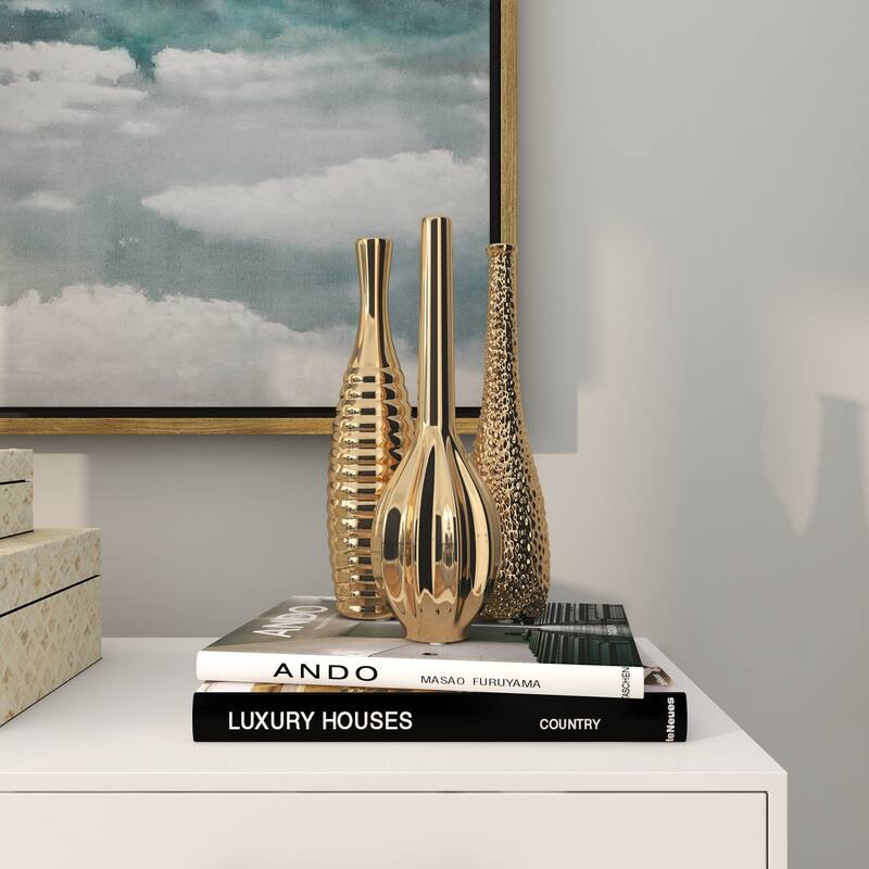 CosmoLiving by Cosmopolitan Sleek Ceramic Glam Vase with Varying Patterns (Set of 3) - Silver, Gold, Dark Blue, White