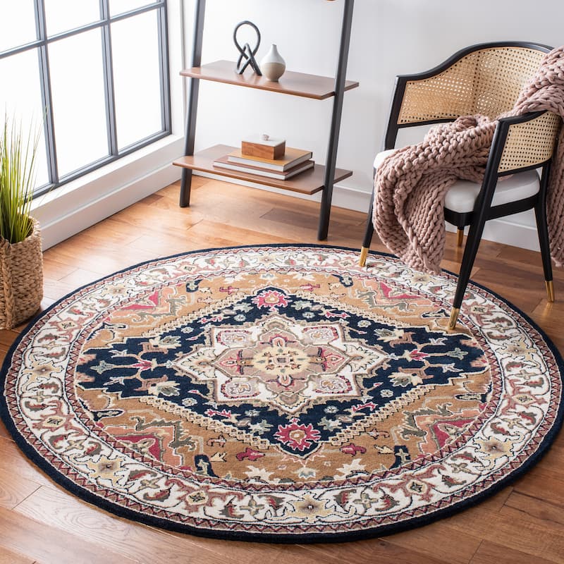 SAFAVIEH Handmade Heritage Carrol Traditional Oriental Wool Rug - 4' Round - Navy/Brown
