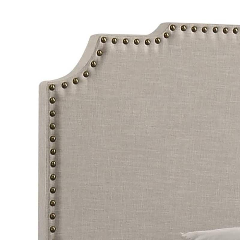 Elegant Beige Upholstered Bed with Nailhead Trim and Scalloped Headboard