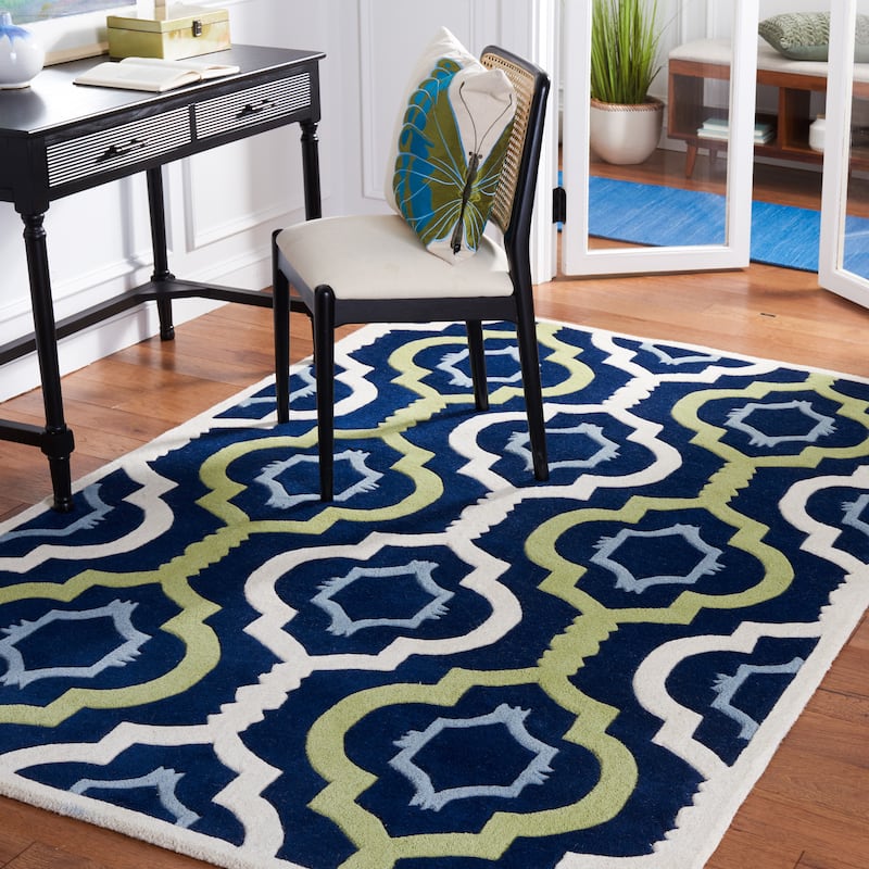 SAFAVIEH Handmade Chatham Vaka Modern Wool Rug - 8'9" x 12' - Dark Blue/Multi