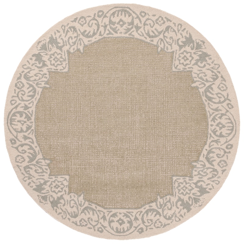 SAFAVIEH Handmade Ebony Snaedis Floral Wool Rug - 6' Round - Beige/Green