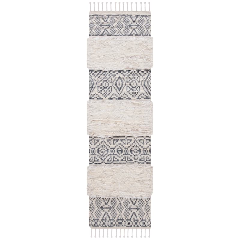 SAFAVIEH Hand-Knotted Manhattan Zulfiya Wool Tassel Rug