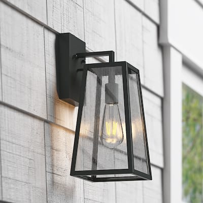 Concise 1-Light Dusk to Dawn Sensor Wall Sconce with Seeded Glass Design