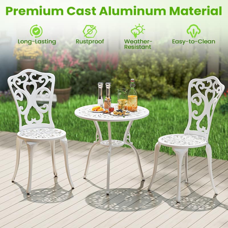 3 Piece White Cast Aluminum Patio Bistro Set with Umbrella Hole and Patterned Chairs - Chair: 20" × 16" × 34"