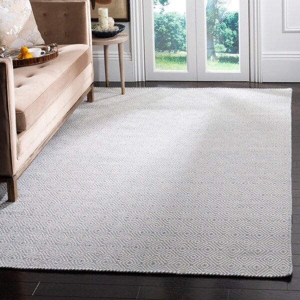 Safavieh Handmade Oasis Evelijn Casual Wool Rug. Opens flyout.