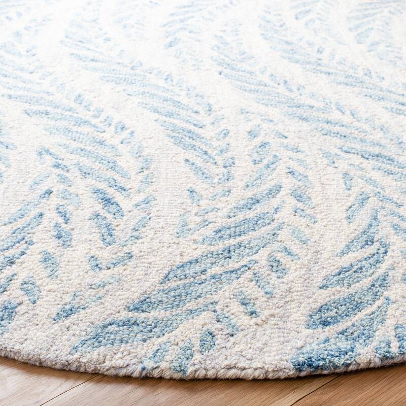 SAFAVIEH Handmade Micro-Loop Maele Modern Wool Rug