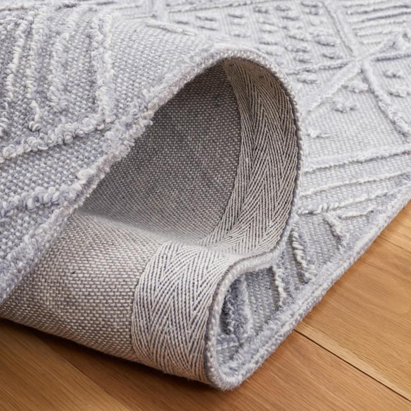 SAFAVIEH Handmade Textual Stephany Wool Rug
