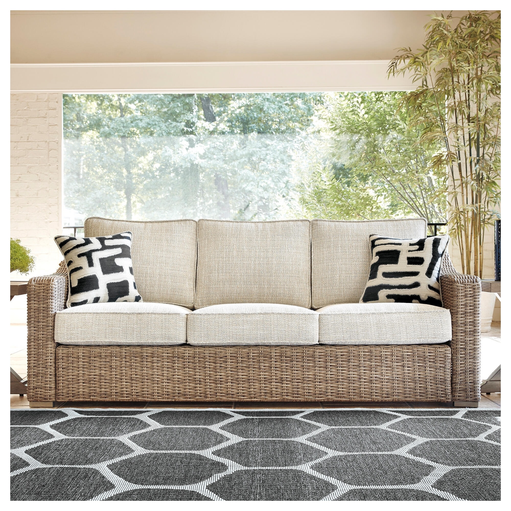 Signature Design by Ashley Beachcroft Outdoor Sofa with Cushion