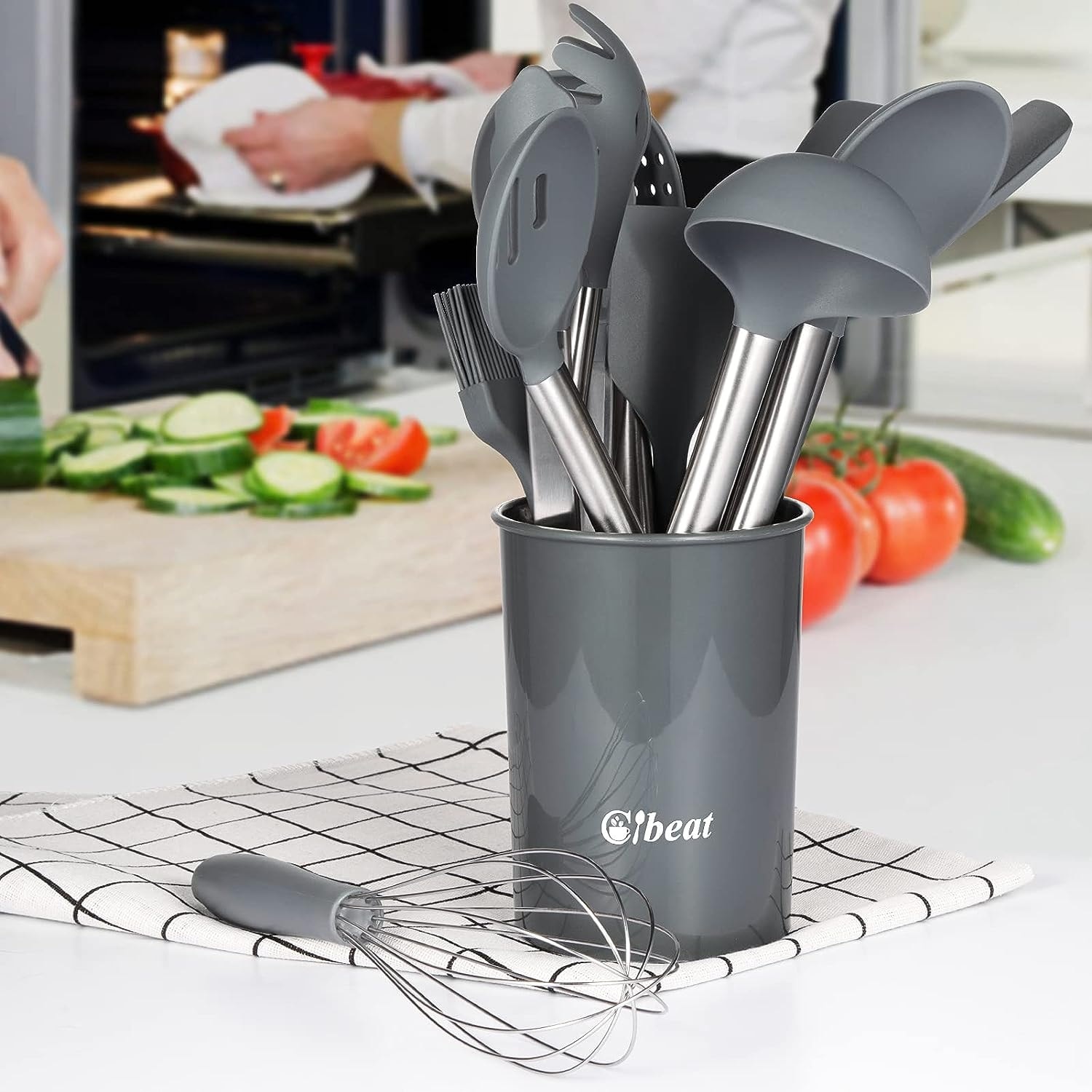 https://ak1.ostkcdn.com/images/products/is/images/direct/f222c95fe7e76a146f1708e4b3bc0059bb90028e/Kitchen-Utensils-Set-with-Holder%2C-Silicone-Cooking-Utensils-Gadget.jpg