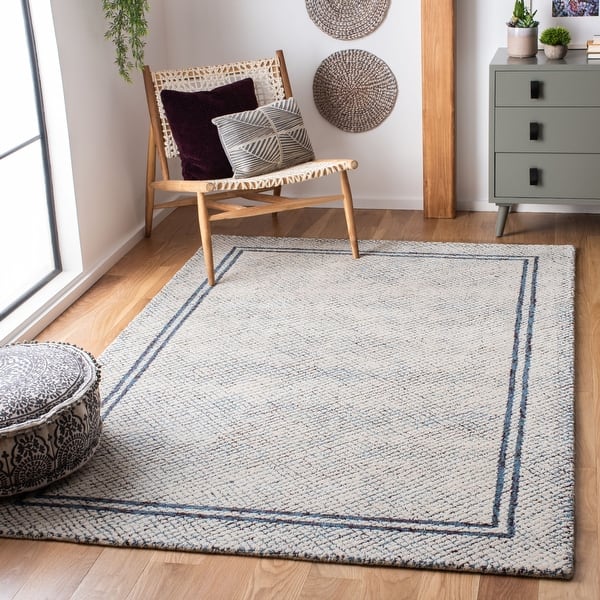 slide 2 of 5, SAFAVIEH Handmade Abstract Adua Modern Wool Rug - Ivory/Navy - 9' x 12'