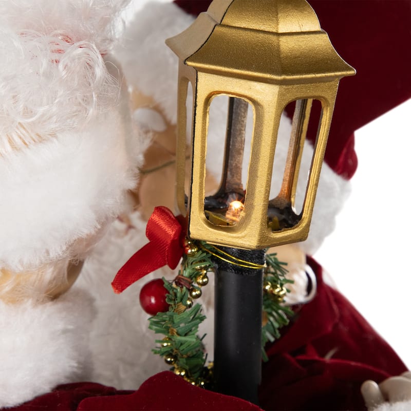 Animated and Musical Mr. and Mrs. Claus Figures with Lighted Lamppost and "Merry Christmas" Sign - 18"