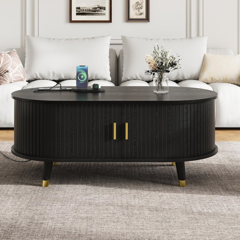 42.5" Mid-Century Oval Coffee Table – Solid Wood Fluted Design with Sliding Tambour Door & Built-In Charging Station. - Black
