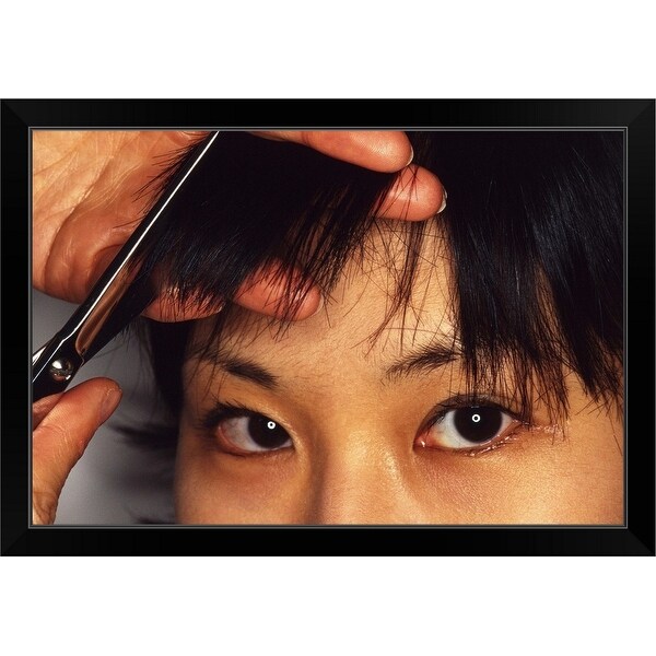 "Woman having bangs cut" Black Framed Print