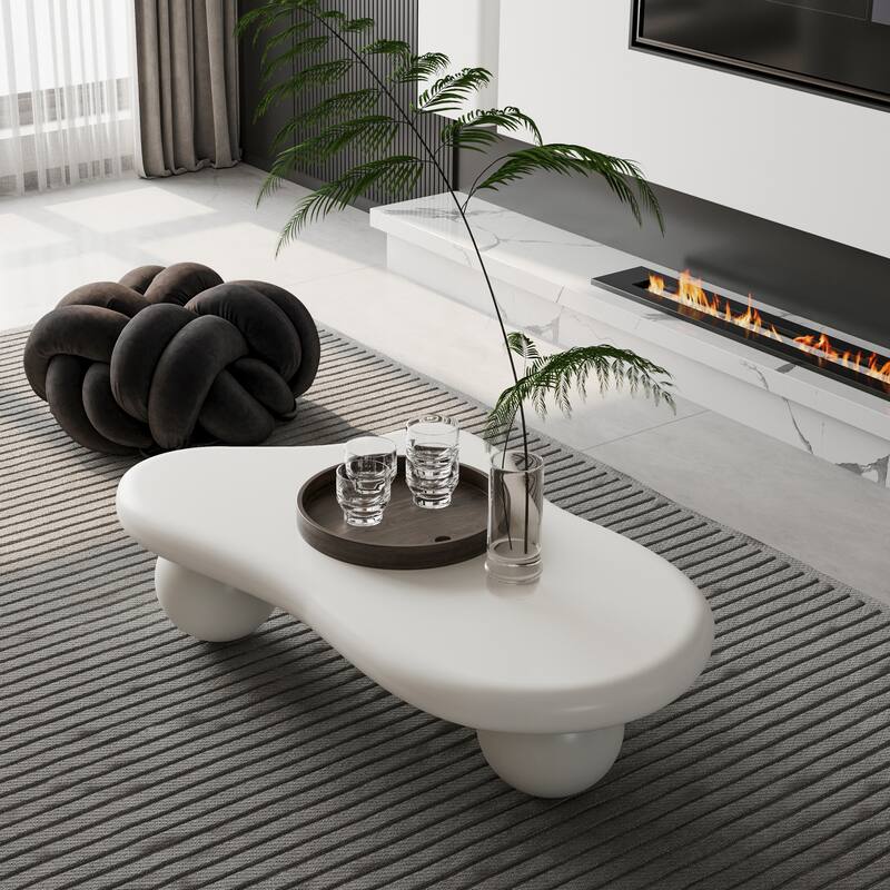47 Inch Cloud Shaped Coffee Table with 3 Ball Legs for Living Room