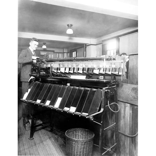 a-us-census-worker-oversees-the-automatic-card-sorting-machine-used-for