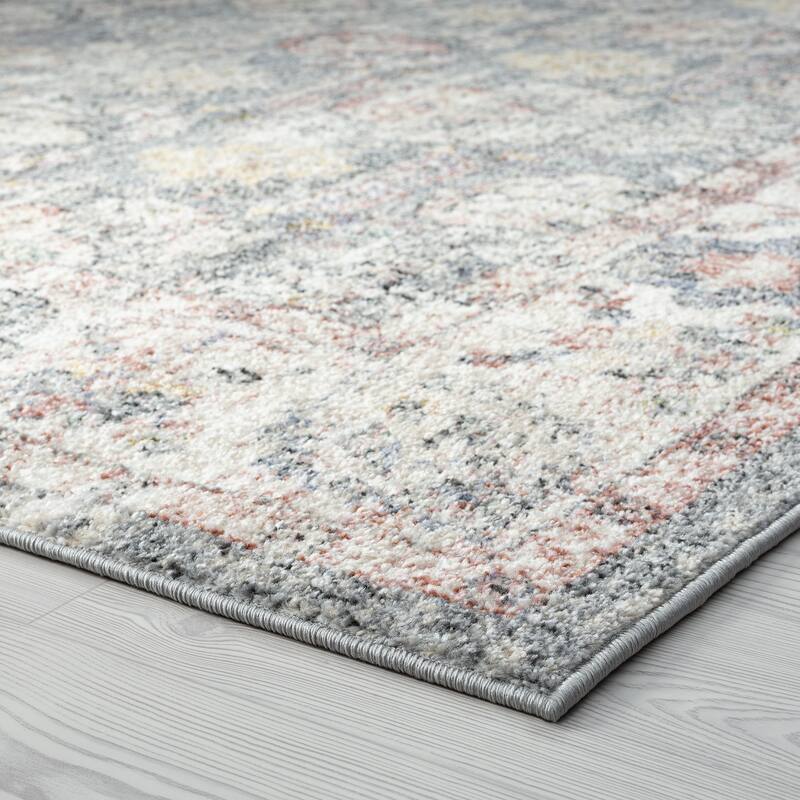 Addalyn Oriental Border Area Rug
