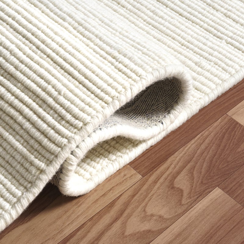 Sevita Solid Casual Hand-Woven Woolen Area Rug