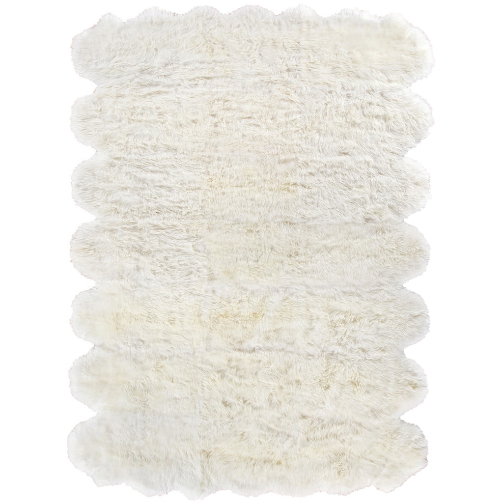 EXQUISITE RUGS Sheepskin Hand-stitched Ivory Area Rug.