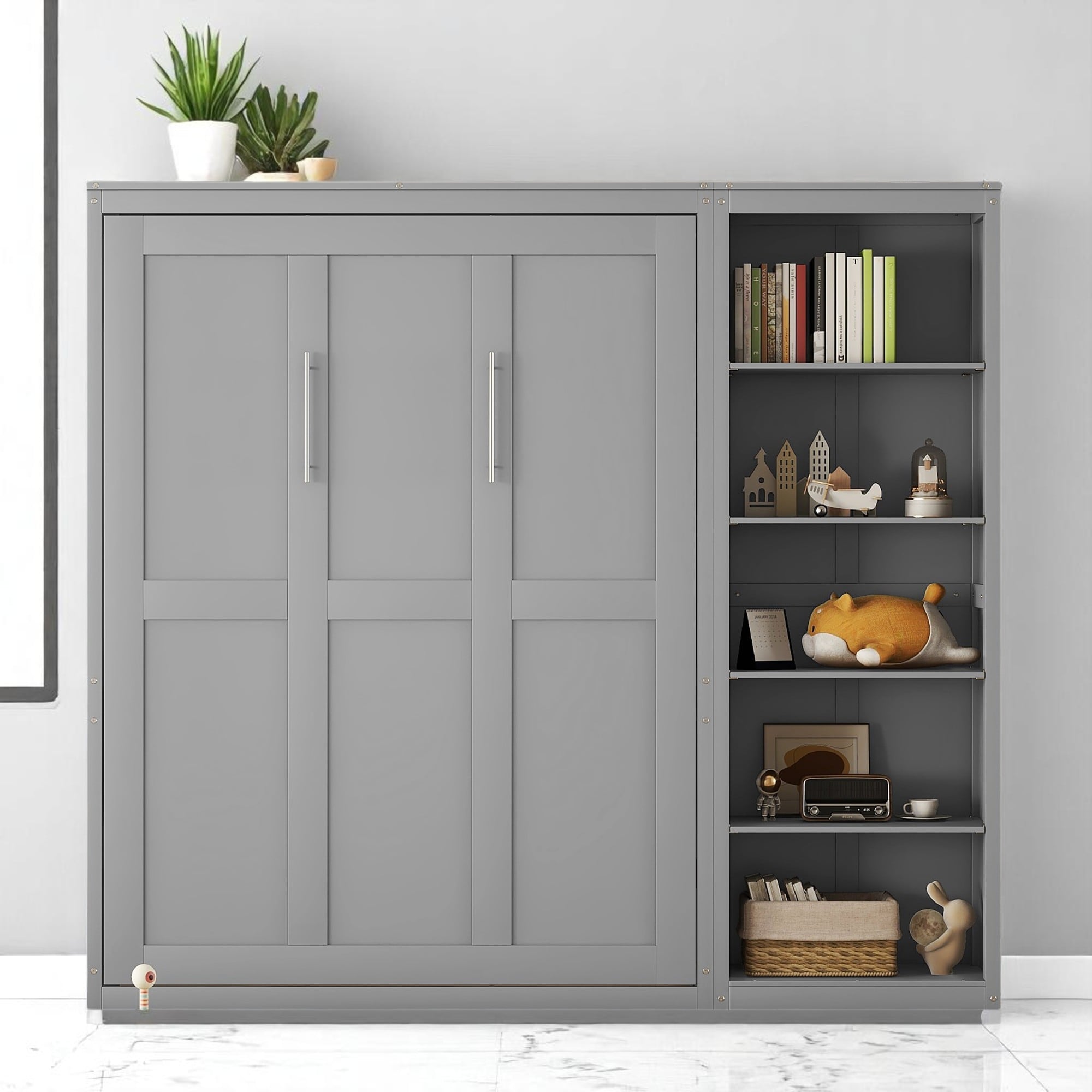 Grey modular wardrobe with sliding doors and open right-side shelving filled with books and decorative items