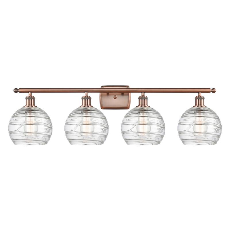 Innovations Lighting Deco Swirl 4 Light 36" Wide Bathroom Vanity Light - Antique Copper / Clear
