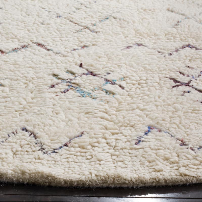 SAFAVIEH Handmade Casablanca Shag Nino Tribal Wool Rug