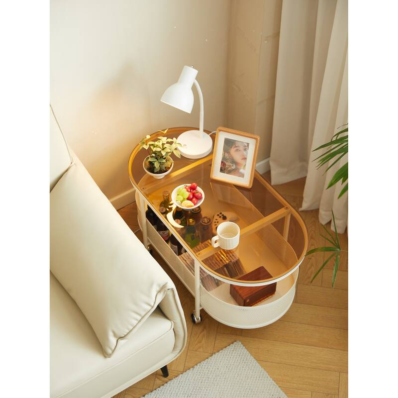 Movable oval metal glass coffee table with storage