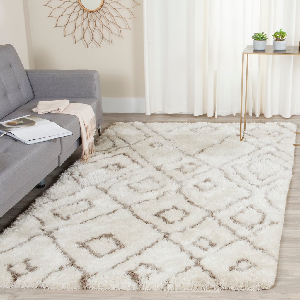 SAFAVIEH Handmade Toronto Shag Delaney Polyester Rug