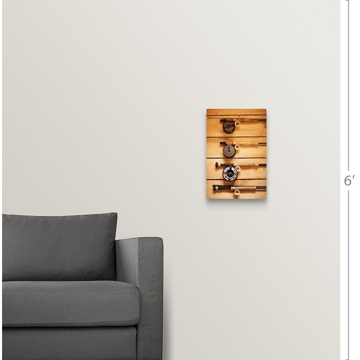 Fly fishing reels hanging on wall Canvas Wall Art - Bed Bath