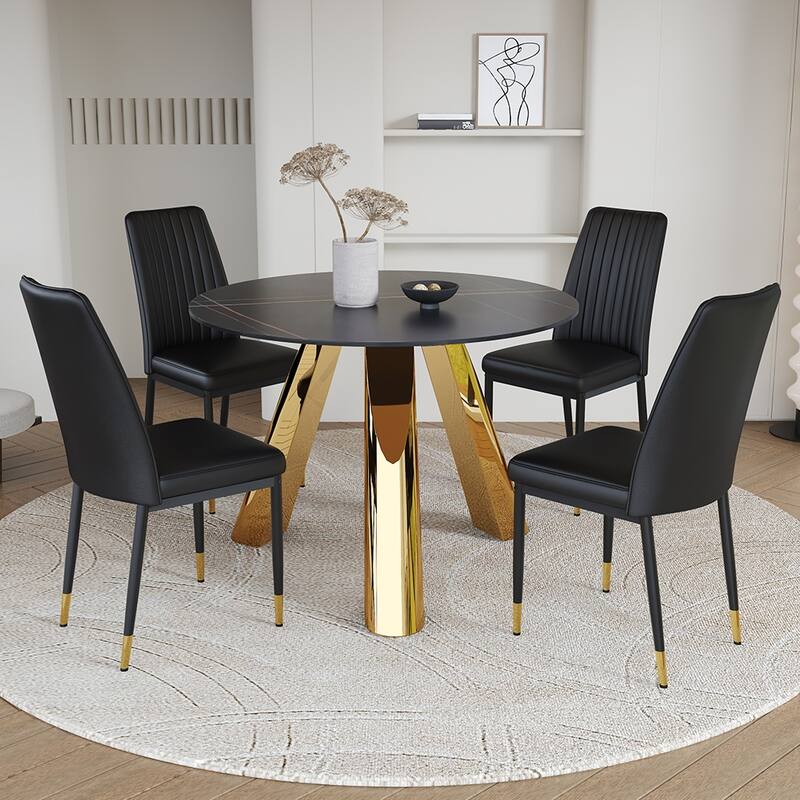 A 42-Inch Round Black Dining Table With A Granite Top And Stainless Steel Legs, Paired With Four Pu Material Dining Chairs