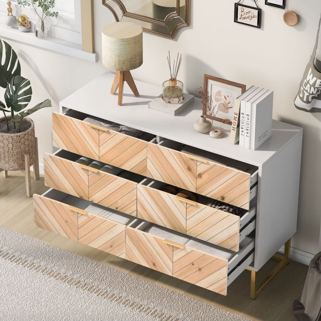 White dresser with natural wood outlet legs