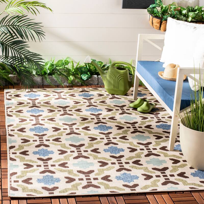 SAFAVIEH Veranda Ranu Indoor/ Outdoor Waterproof Patio Backyard Rug - 5'3" x 7'7" - Cream/Aqua