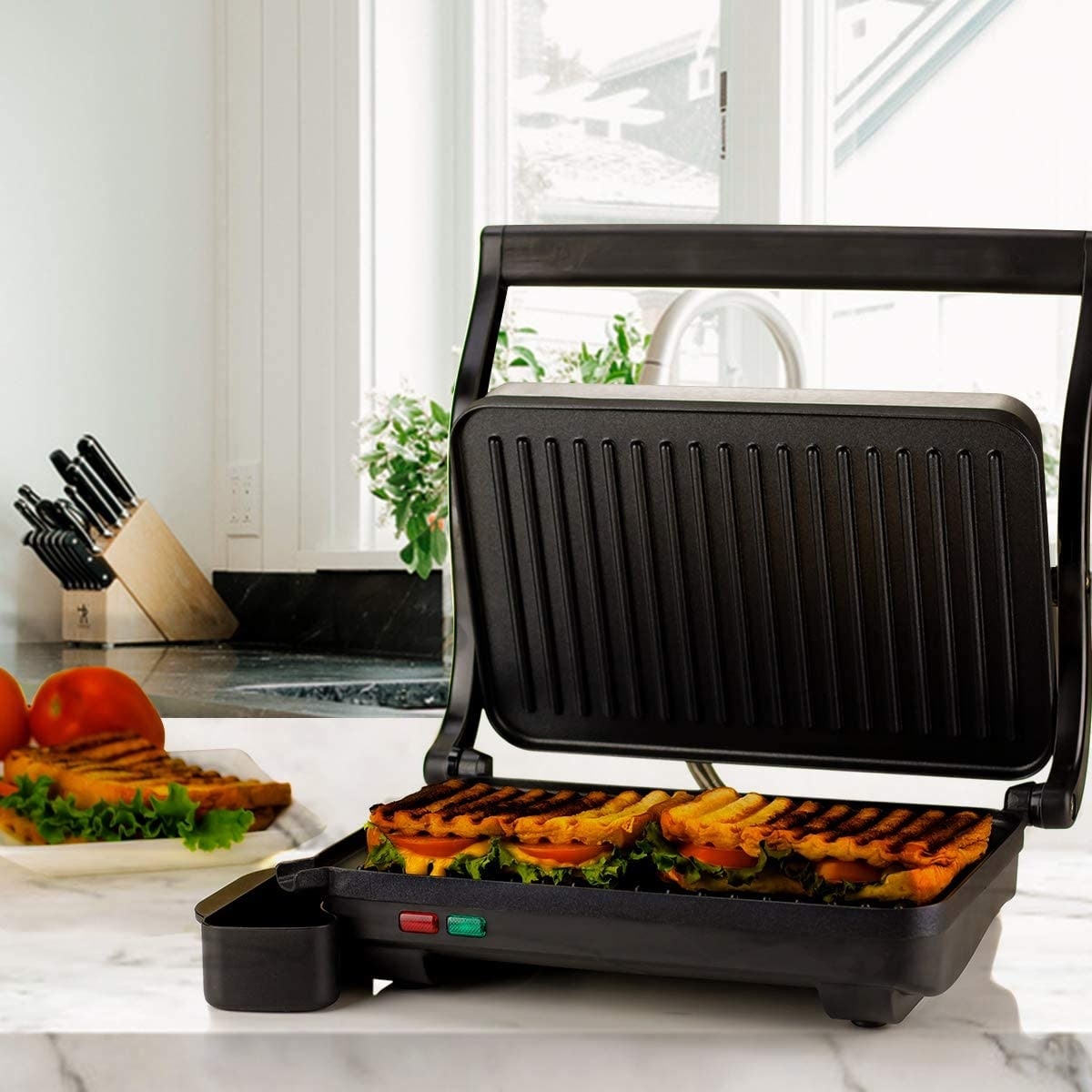https://ak1.ostkcdn.com/images/products/is/images/direct/f3d720874df68e9a3f9652276d4a208636cb9402/Ovente-Electric-Panini-Press-Grill-Sandwich-Maker-GP0620-Series.jpg