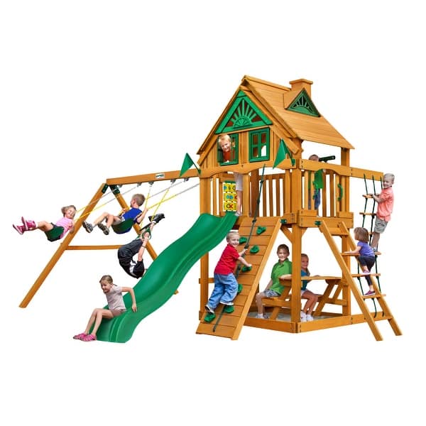 slide 1 of 10, Gorilla Playsets Chateau Treehouse Wood Swing Set with Built-In Picnic Table, Rock Wall, and Wave Slide