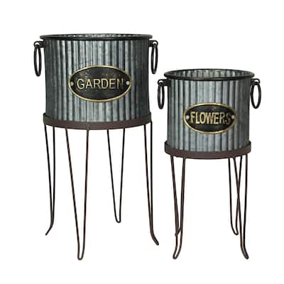Zeckos Galvanized Metal Round Garden Planters With Stands (Set Of 2) - 19.25 X 12 X 12 inches