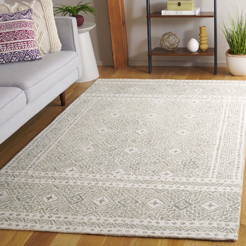SAFAVIEH Handmade Micro-Loop Jelske Wool Rug