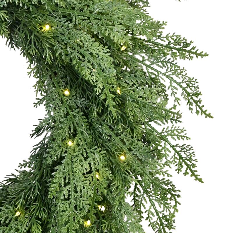 Puleo International 24" Pre-Lit Battery-Operated Artificial Flocked Wreath with Twinkle Rice Lights
