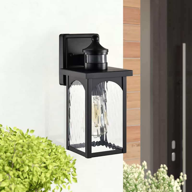 12 in. 1-Light Matte Black Motion Sensing Dusk to Dawn Outdoor Hardwired Wall Lantern Sconce with Clear Water Wave Glass