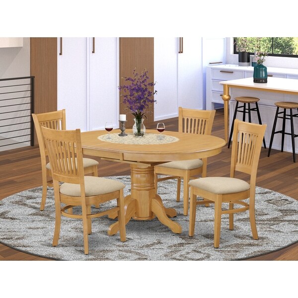 5-piece Dining Set Includes Oval Table and 4 Chairs In Oak Finish. Opens flyout.