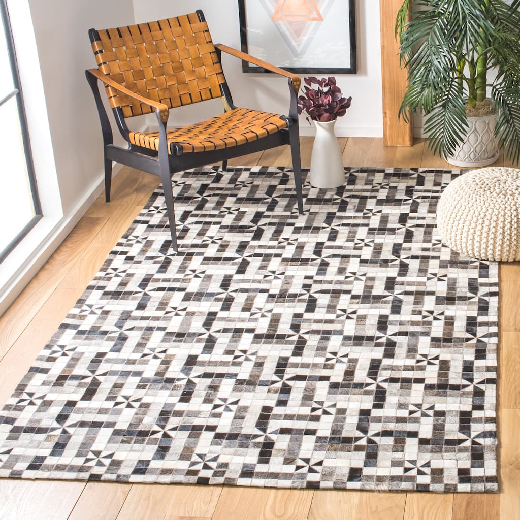 SAFAVIEH Handmade Studio Leather Tamekia Modern Leather Rug