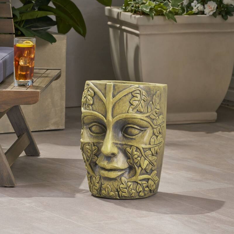 Outdoor stone statue planter with drainage hole, suitable for garden and patio.