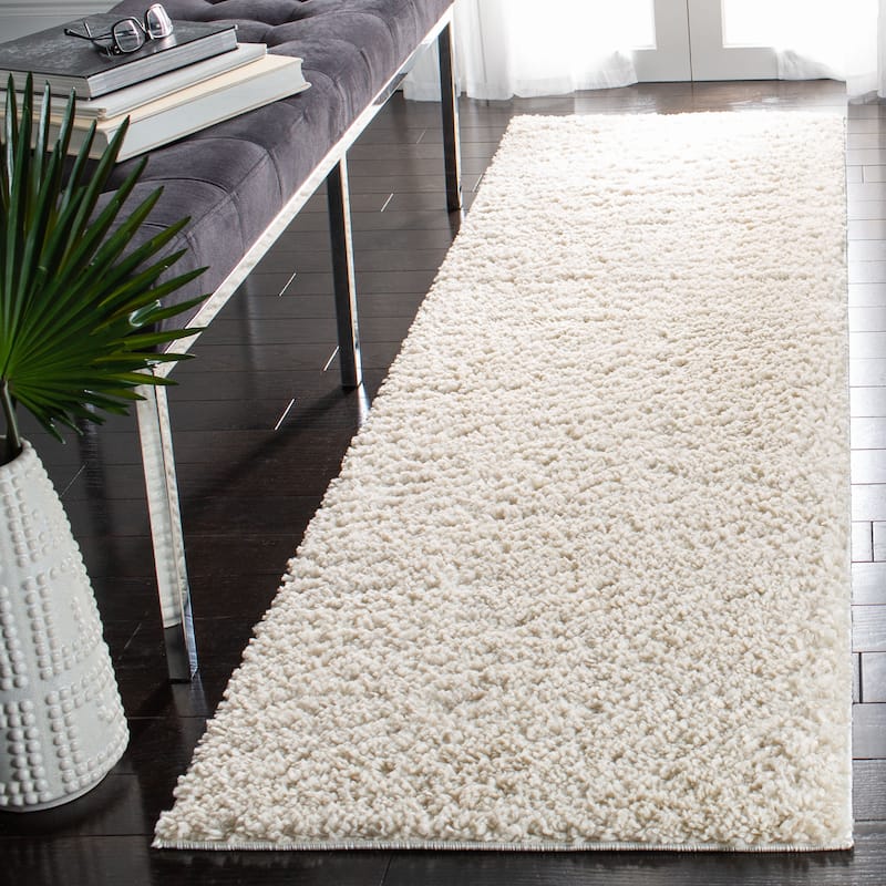 SAFAVIEH August Shag Solid 1.2-inch Thick Area Rug - 2'3" x 12'  Runner - Ivory