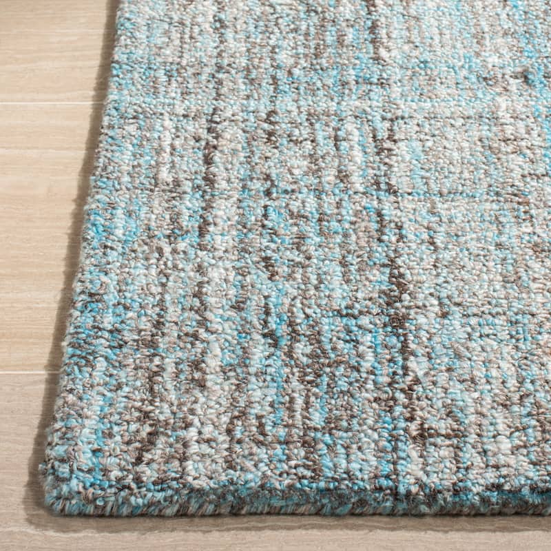 SAFAVIEH Handmade Abstract Nettie Modern Viscose Rug