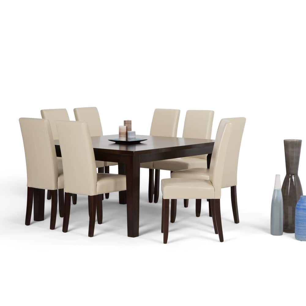 WYNDENHALL Normandy Transitional 9 Pc Dining Set with 8 Upholstered Parson Chairs and 54" Wide Table