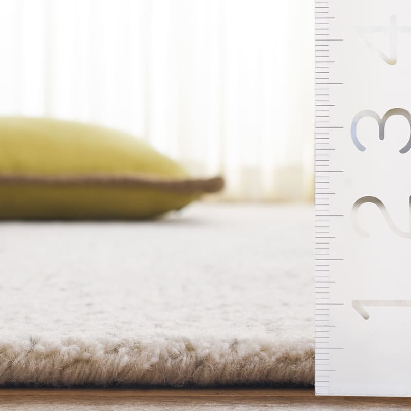 SAFAVIEH Handmade Ebony Herlaug Modern Wool Rug