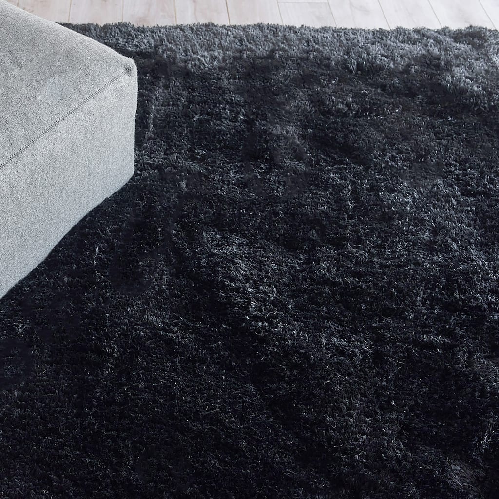 EXQUISITE RUGS Sumo Shag Hand-loomed Polyester/Microfiber Black Area Rug.
