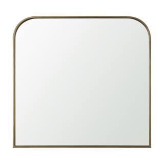 Timon is a square mirror with an arched brushed gold metal frame. - 36.0L x 1.8W x 34.3H