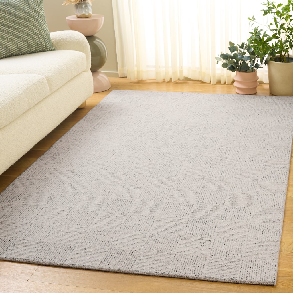 SAFAVIEH Handmade Ebony Ivon Wool Blend Rug