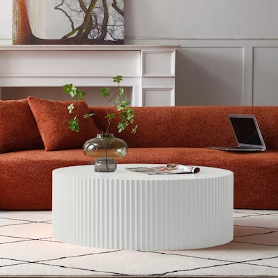 Contemporary Round Coffee Table with Handcrafted Relief